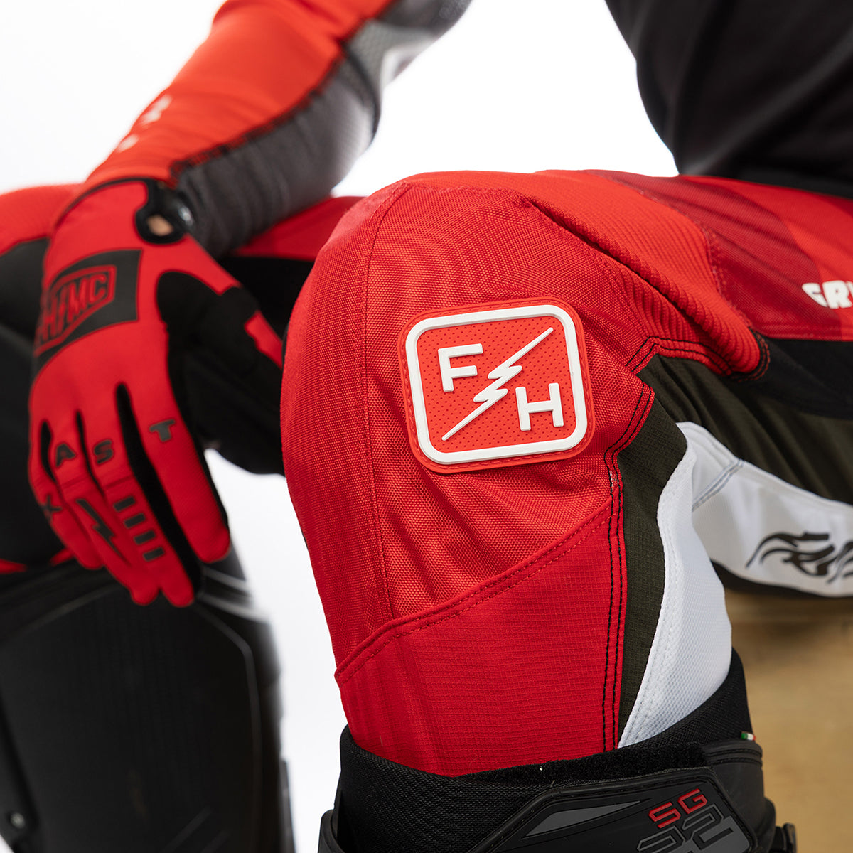 Fasthouse Grindhouse Atomic Hose – Racing Rot/Schwarz